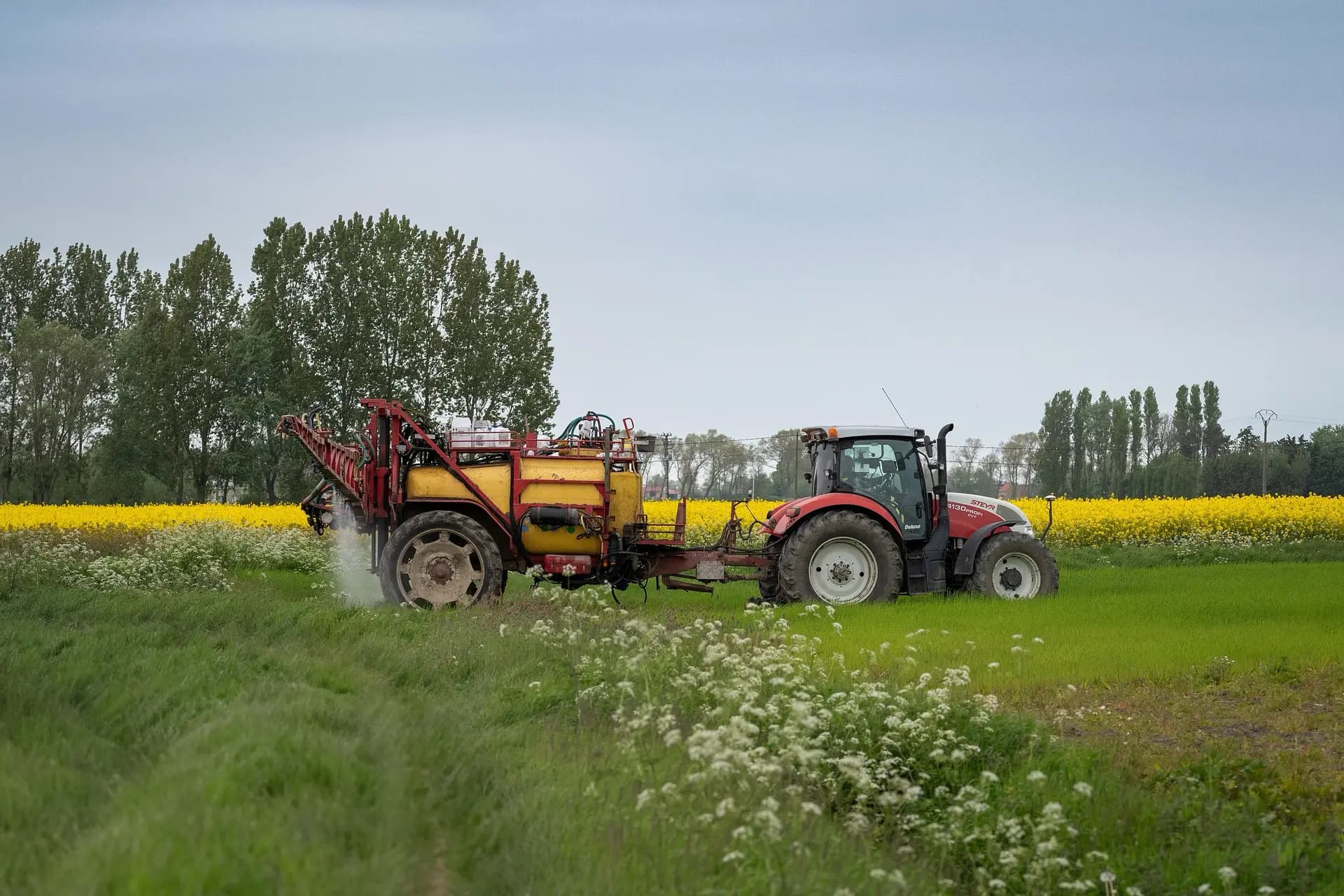 Farm machinery working a field